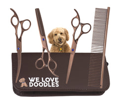 We Love Doodles straight scissor in hand for precise trimming on doodle coats.