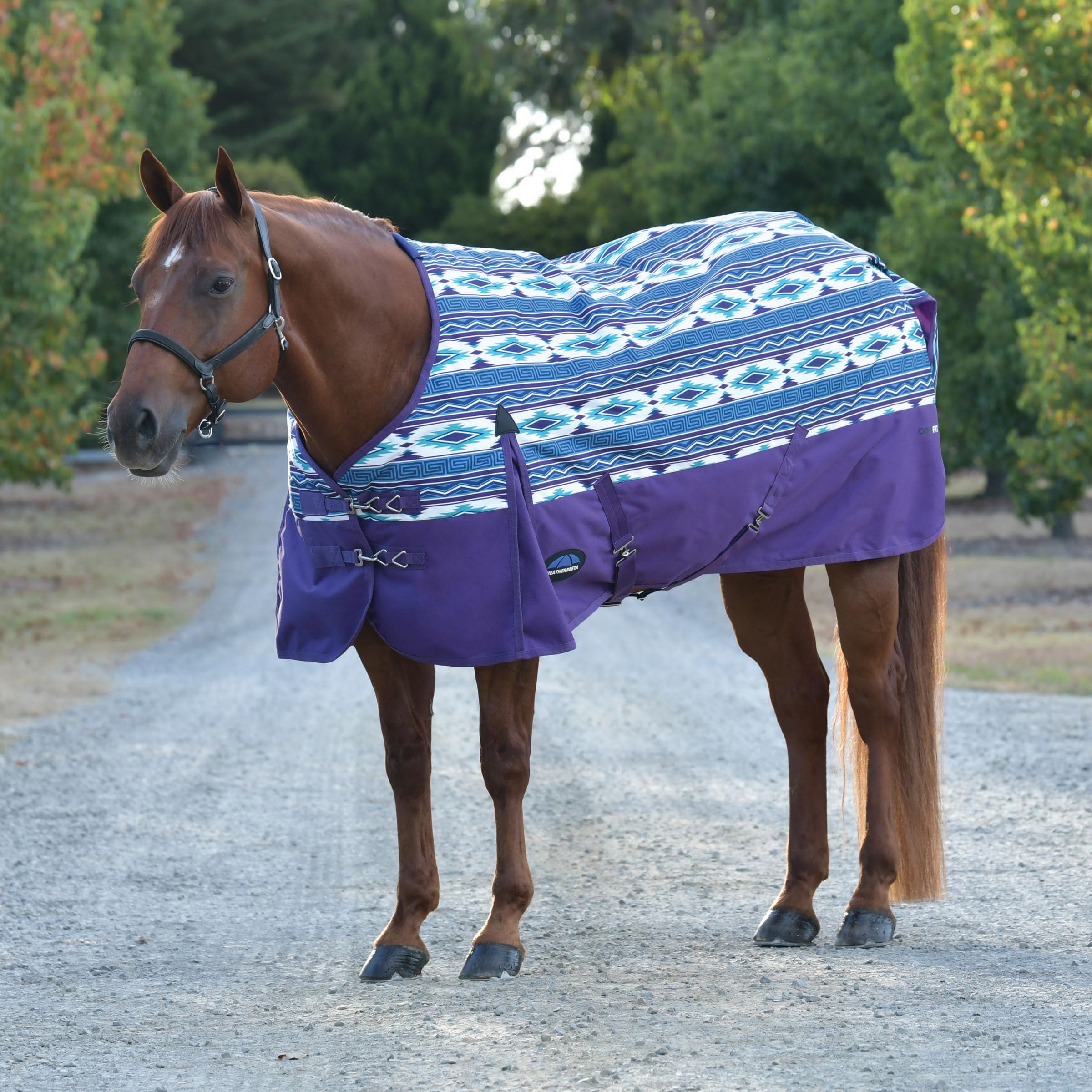 WeatherBeeta ComFiTec Essential Turnout 220G side view—secure fit with leg straps for field stability.