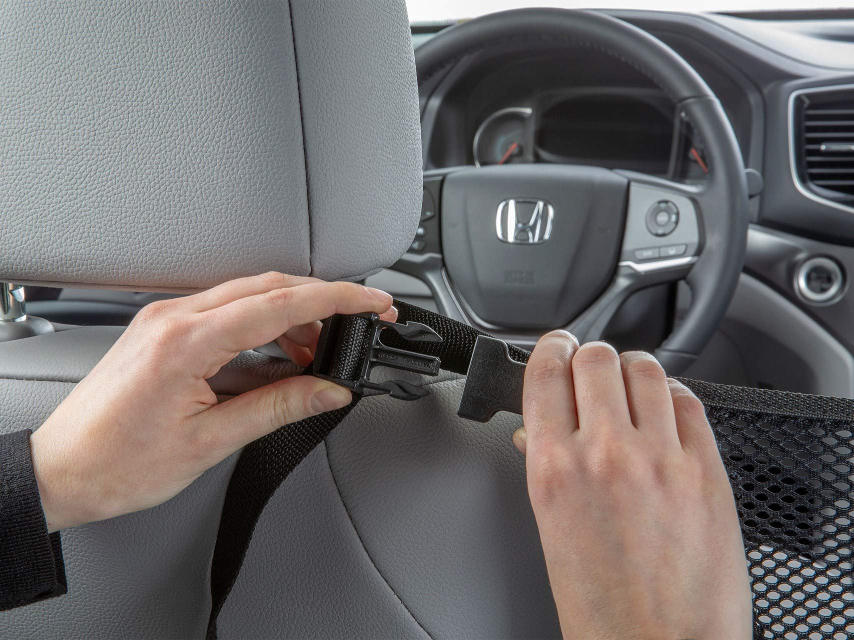 WeatherTech Pet Partition easy-clean design; wash and air-dry after trips.