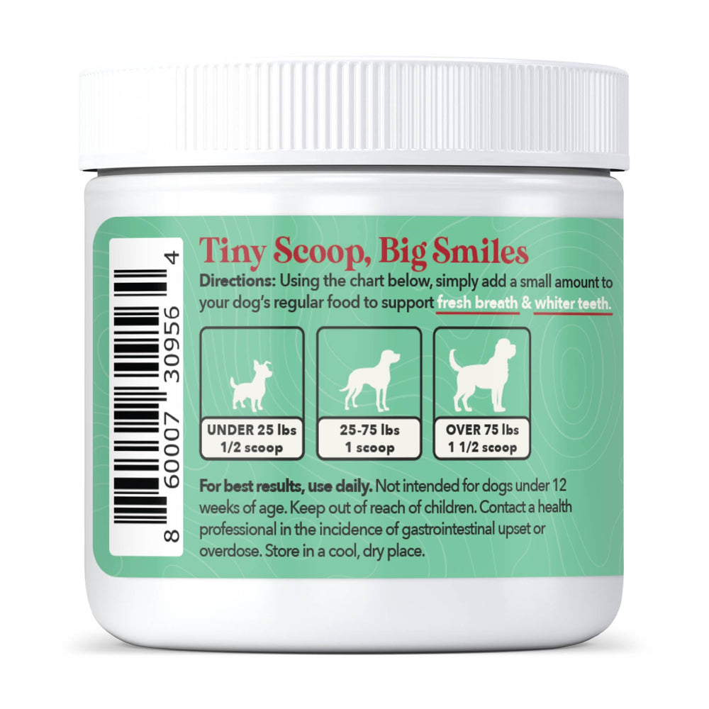 Wild Acre dental powder on dog teeth demonstration of fresh breath benefits.
