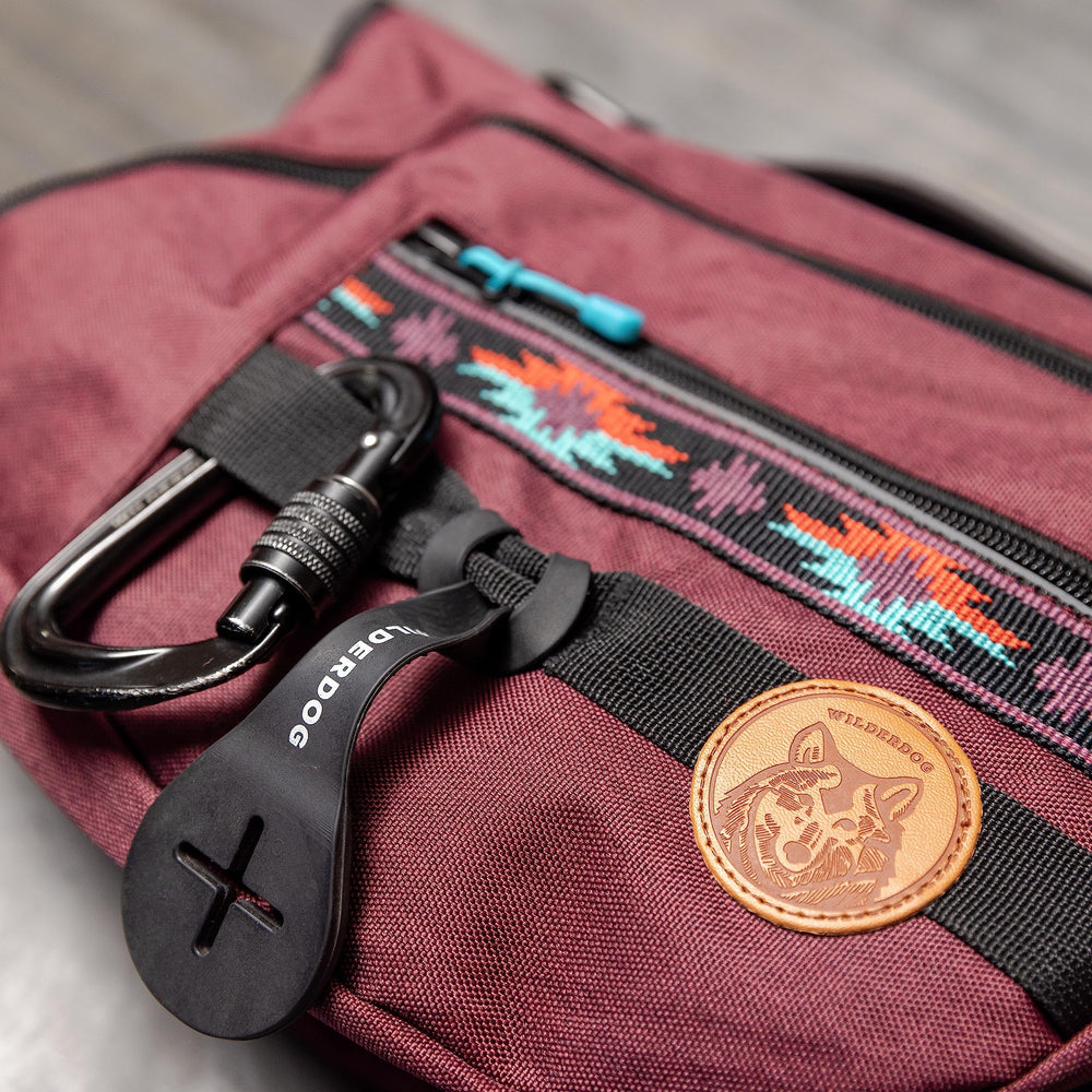 Wilderdog built-in poop bag dispenser provides convenient cleanup access.