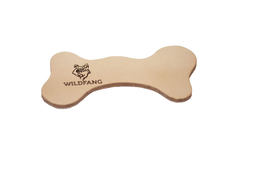 Wildfang leather dog toy large texture-scent close-up emphasizes leather aroma and engagement.
