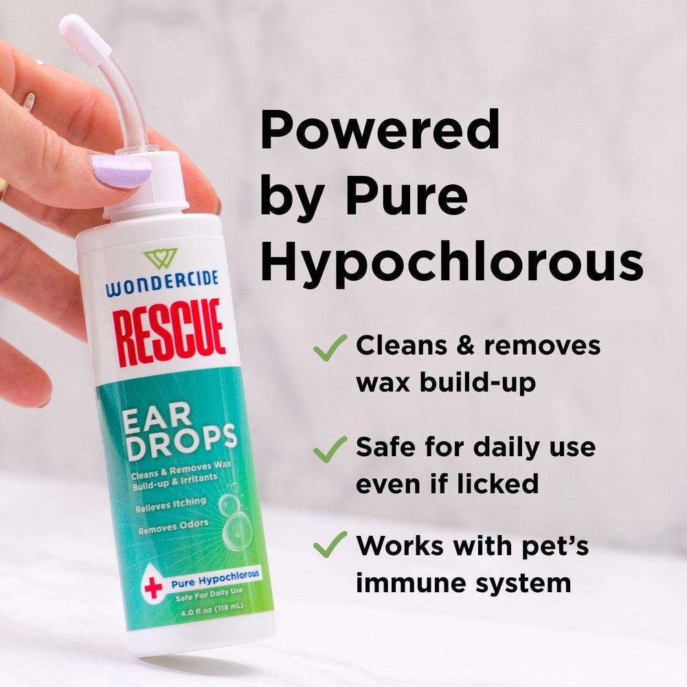Wondercide Rescue Ear Drops close-up bottle and dropper in use