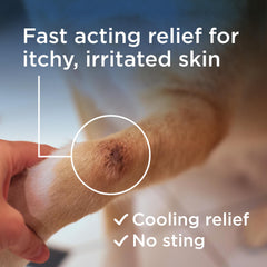 Wondercide Rescue Skin Spray applied to paw for cooling itch relief on-the-go.