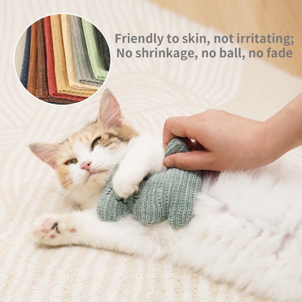 WONOWPA catnip toy being chewed by a kitten demonstrates bite-resistant design.