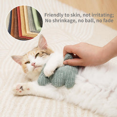 WONOWPA catnip toy being chewed by a kitten demonstrates bite-resistant design.