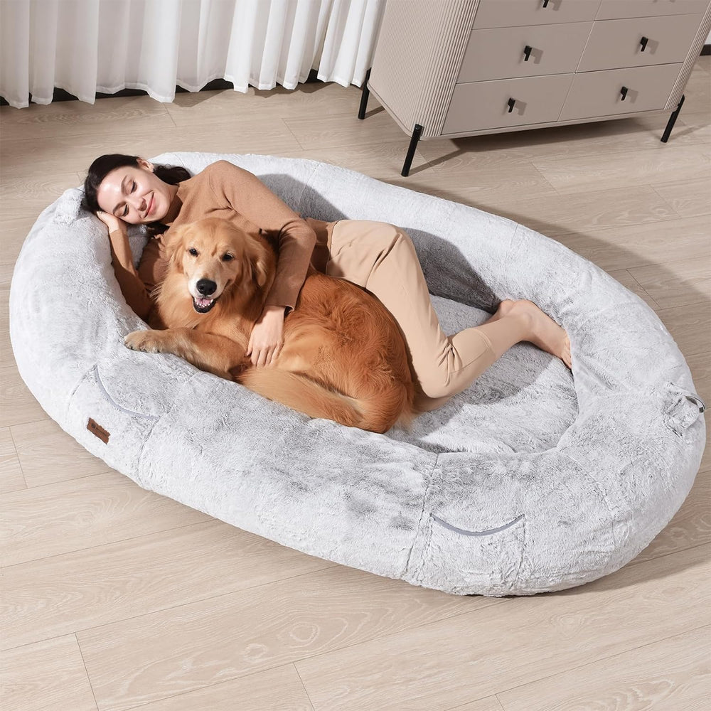 WOZOKE Human Dog Bed giant size beside a couch offers shared lounging for family moments.