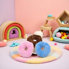 WsjiaboFux color donuts in action, durable chew toys for pets.