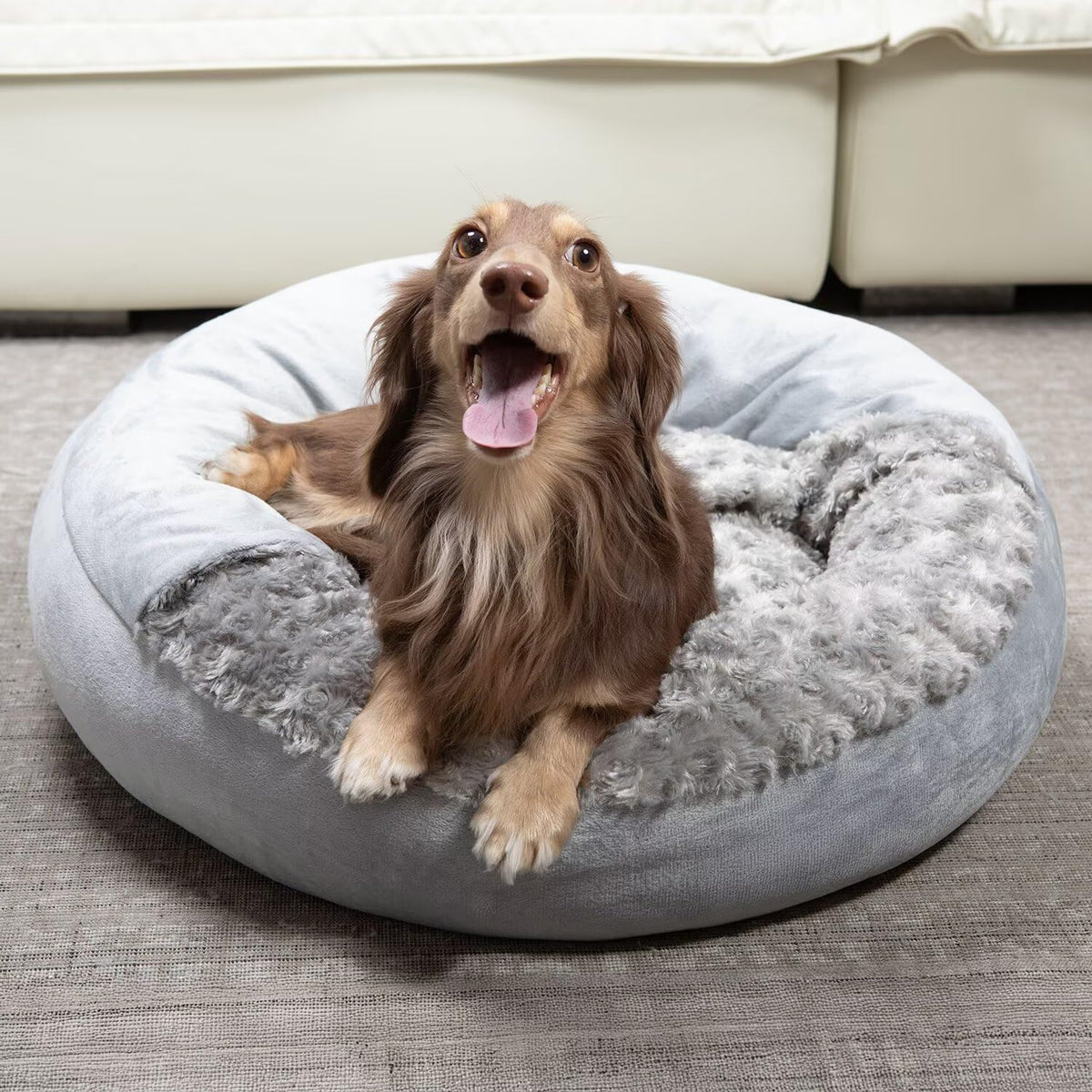 Xavaro cave dog bed donut plush rosy fur close-up highlighting cozy comfort.