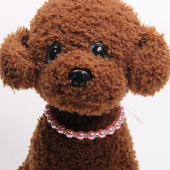 XKSRWE dog-cat-pearls-necklace-pink-side-view shows adjustable extension for fit.