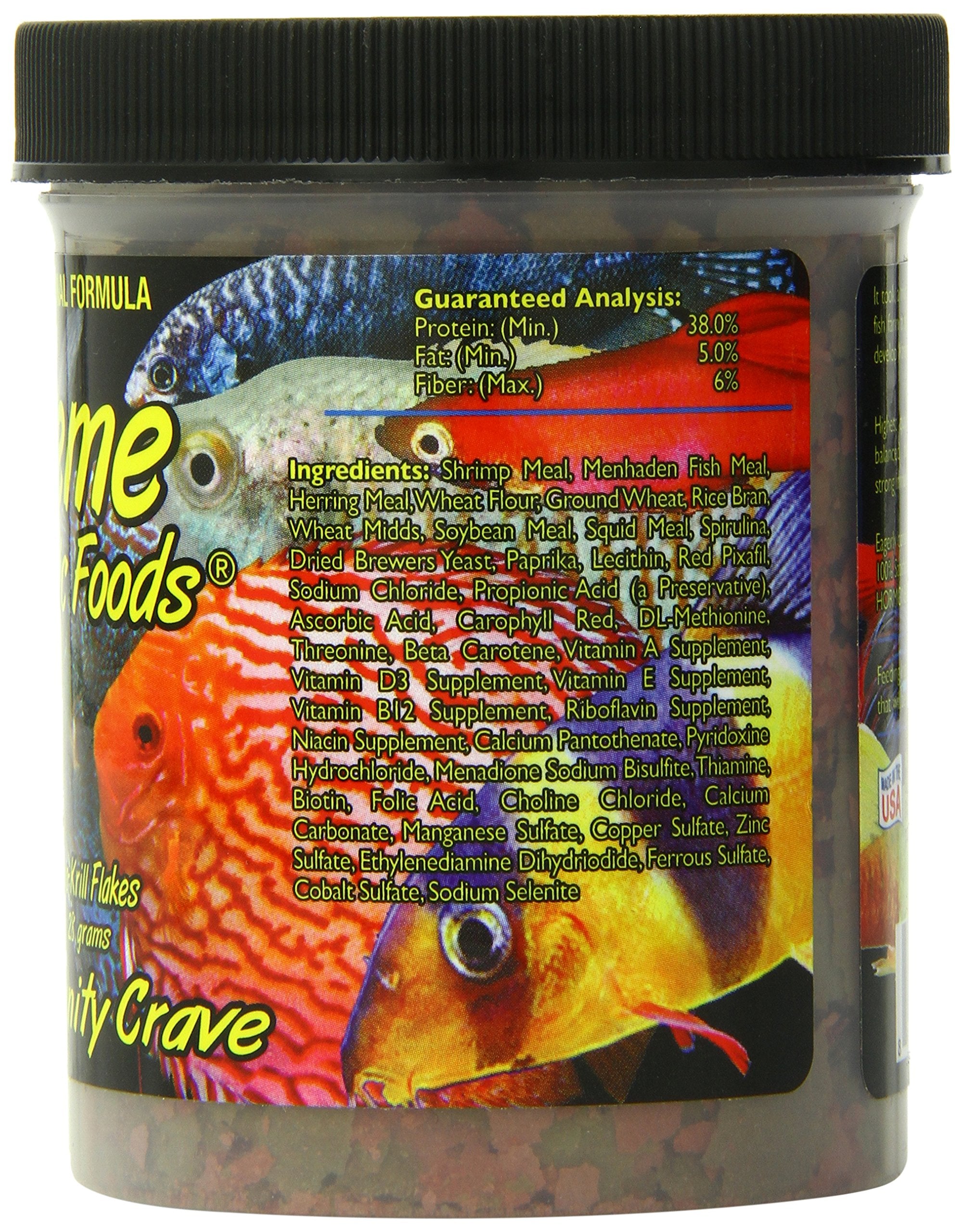 Xtreme Community Crave flakes dispersing in water for crystal-clear tank conditions