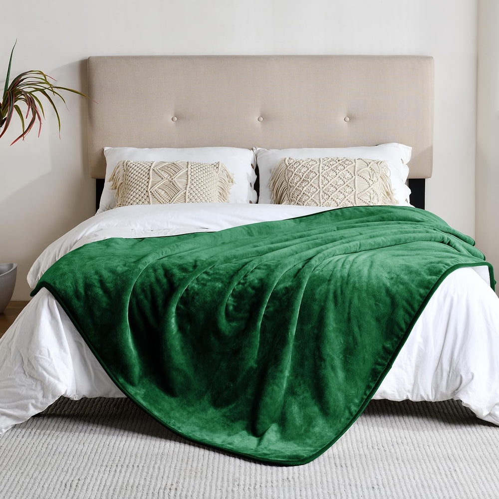 Yaning green 60x80 blanket covering furniture and car seats for protection.