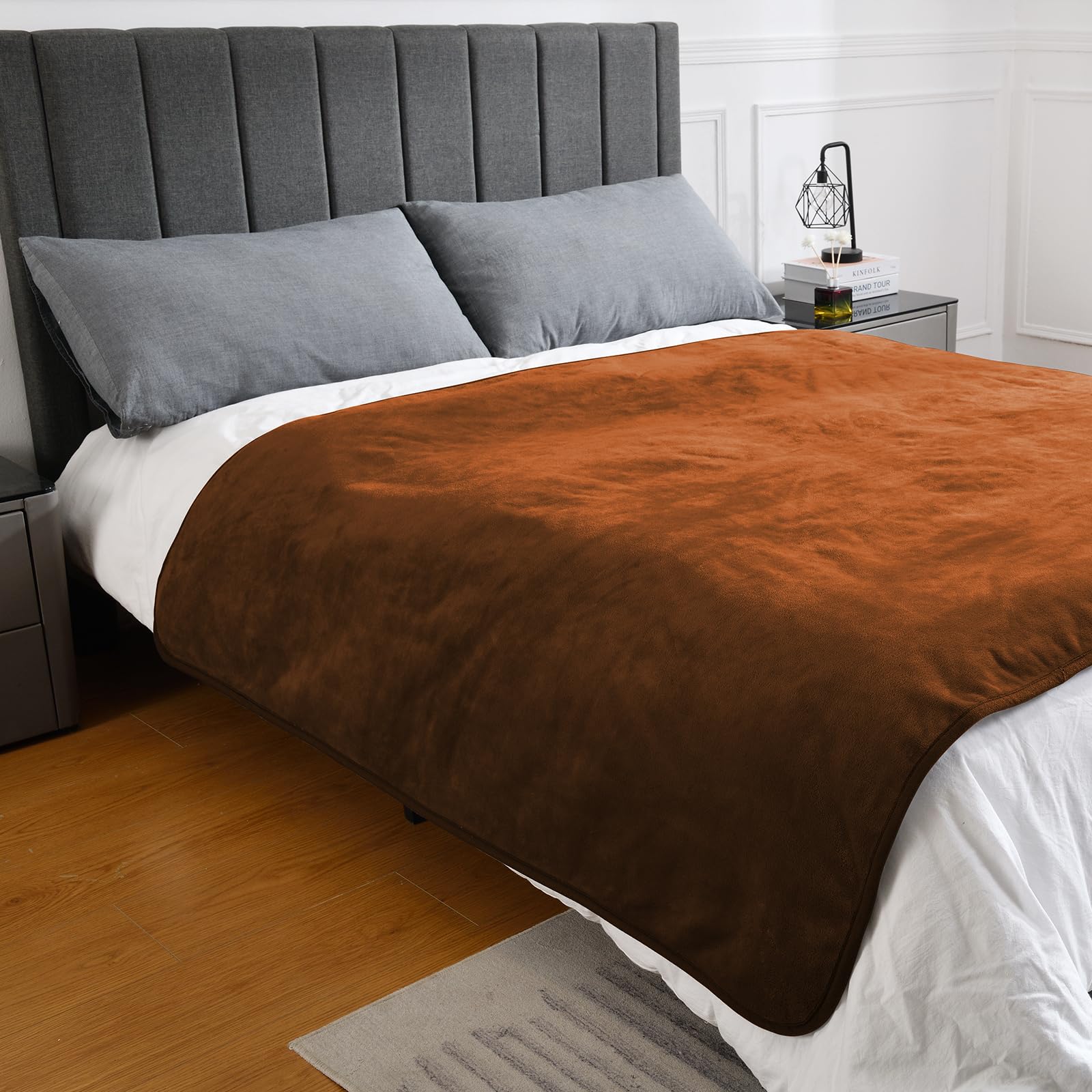 Yaning pet blanket protects beds from fur, spills, and stains during everyday use.