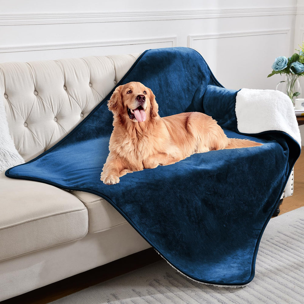 Yaning reversible sherpa and flannel blanket offers two cozy sides for pets.