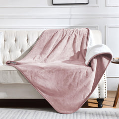 Yaning waterproof blanket bed top view in dusty pink provides cozy bed protection