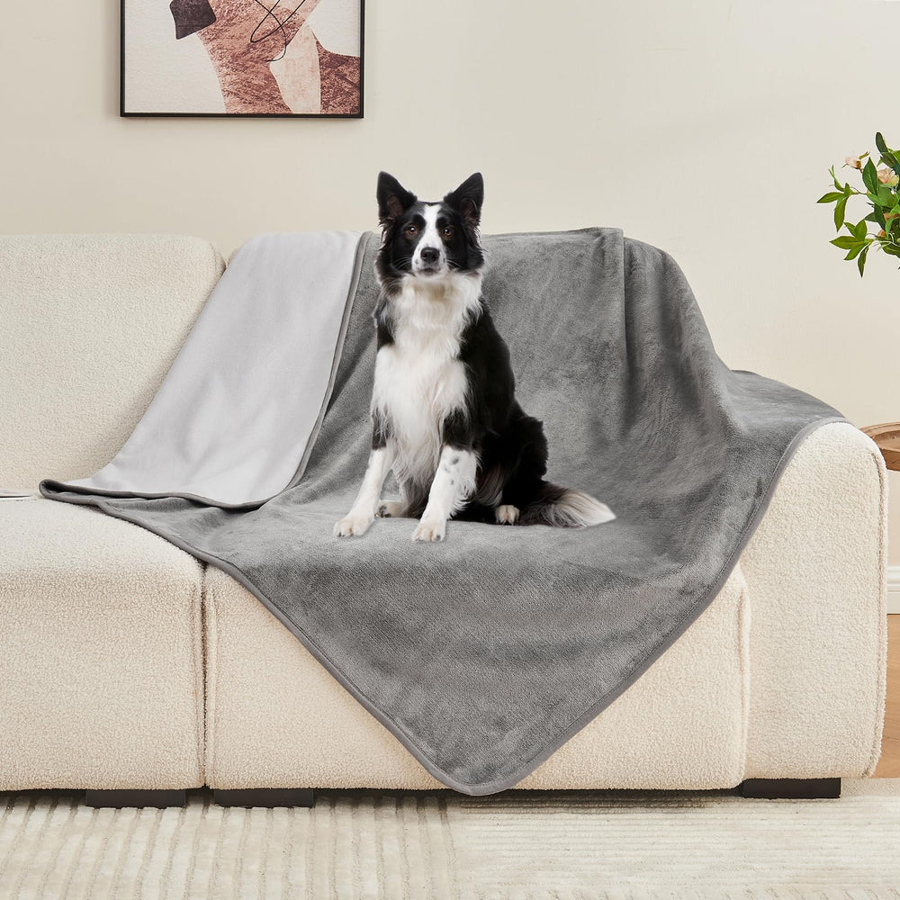 Yaning Waterproof Blanket durable stitching and two color options.