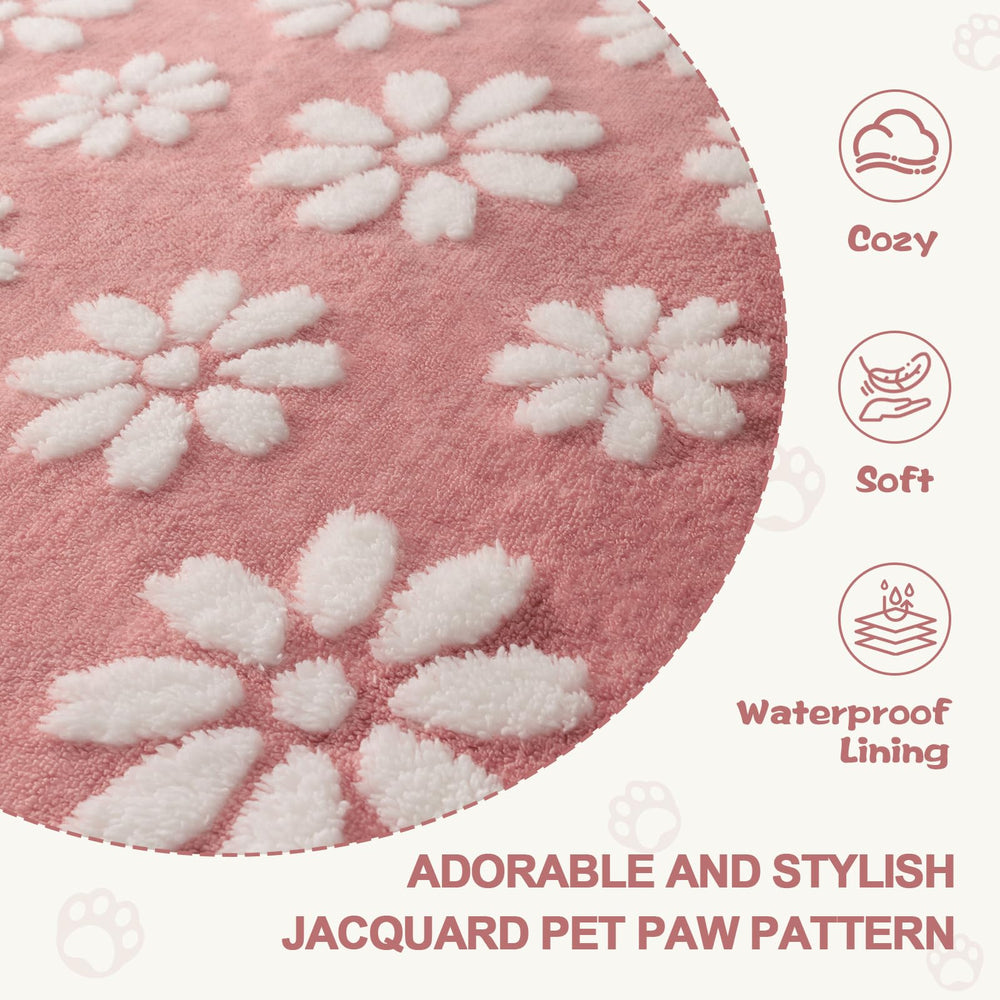 Yaning waterproof blanket pink on car seat shows spill and dirt protection.