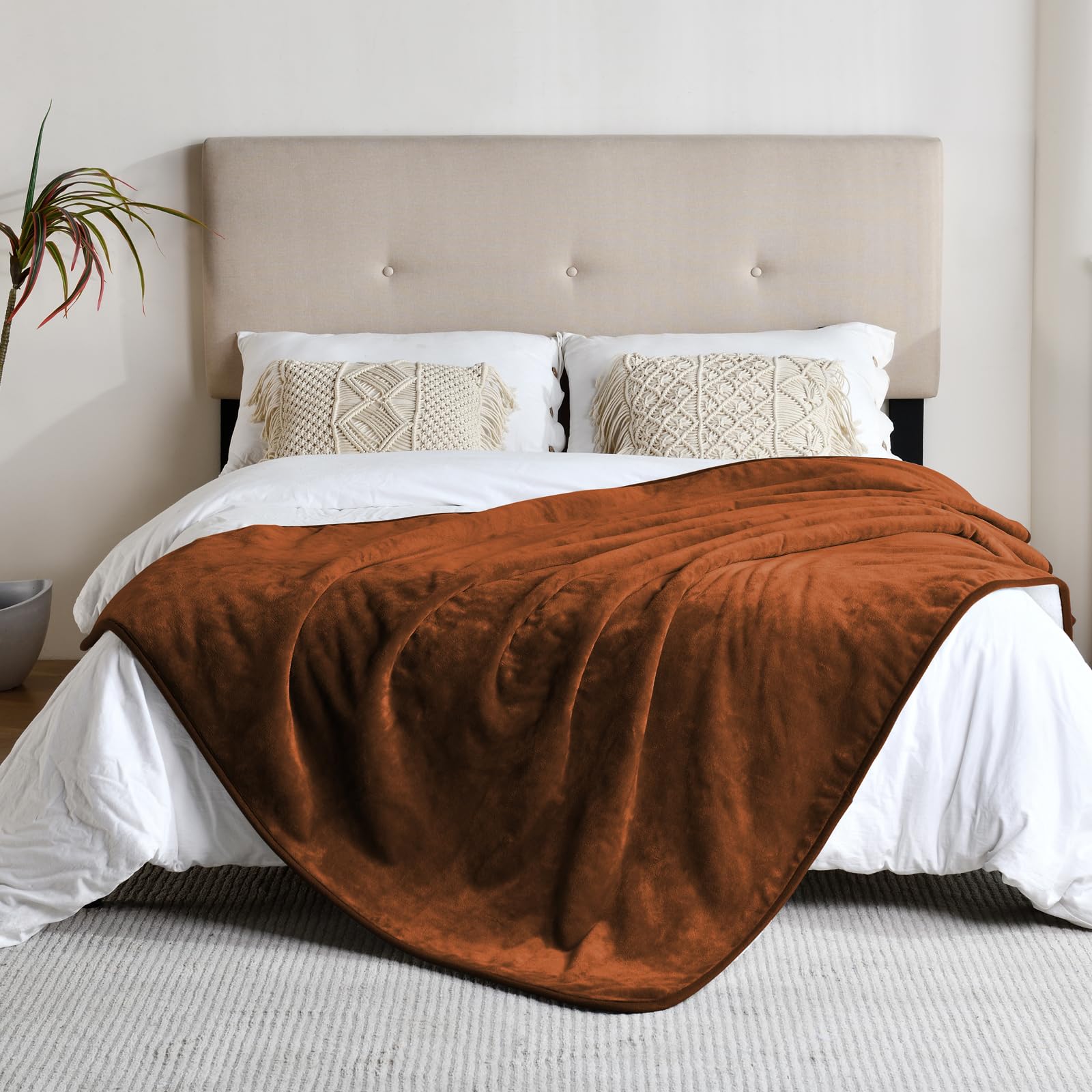 Yaning blanket features waterproof interior coating to block leaks while staying soft on surfaces.