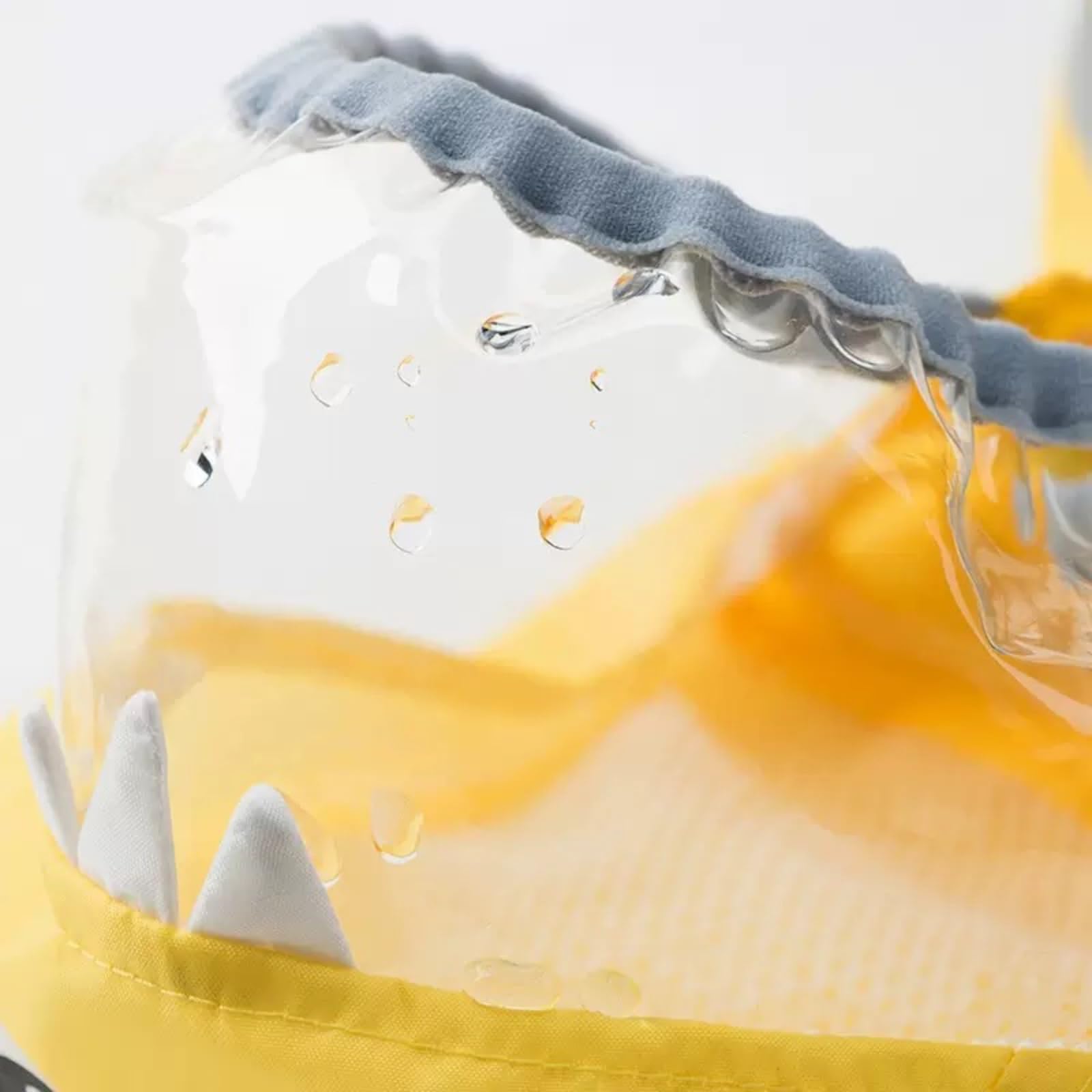 Yellow Dinosaur dog raincoat with reflective strips improves night visibility