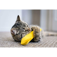 Yeowww! DuckyWorld banana catnip toy in-use shows active batting and tossing play