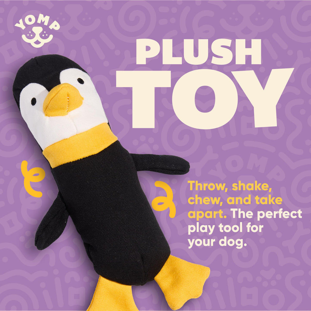 Yomp Penguin Dog Toy close-up canvas texture showcases natural materials for safe, sturdy fun.