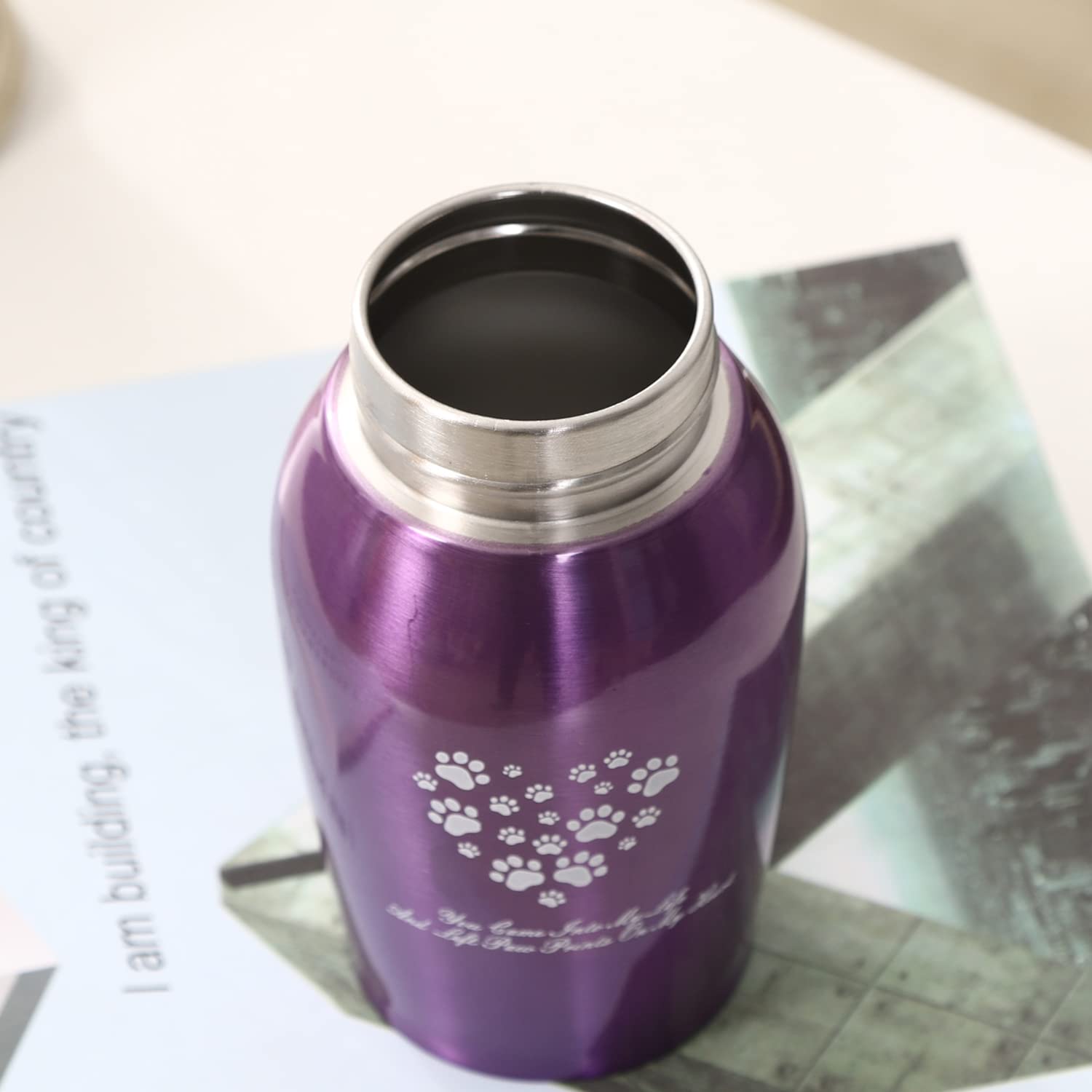 Youdear Memorials durable stainless steel urn conveys lasting tribute for pets.