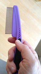 yumflan flea comb used on cat and dog for versatile grooming