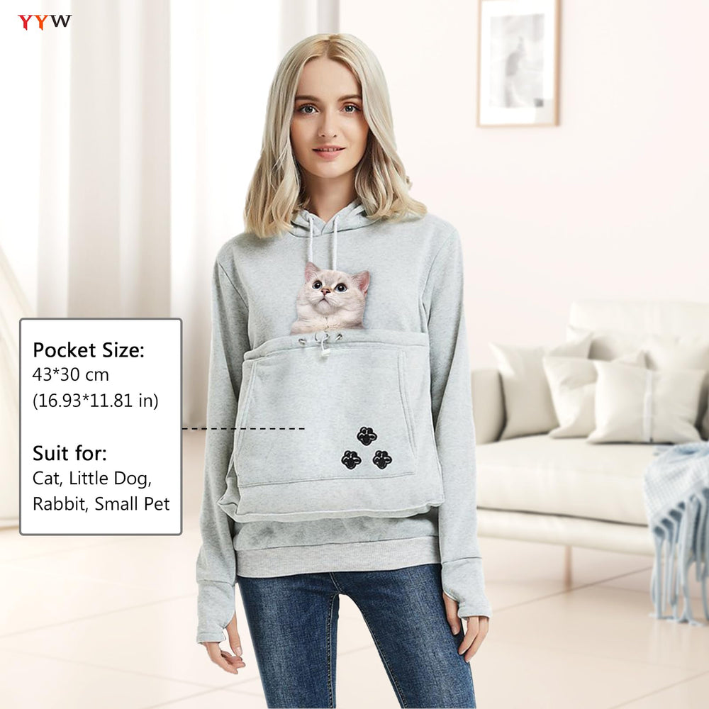 YYW hoodie pocket usage demonstrates space for phone or snacks while out.
