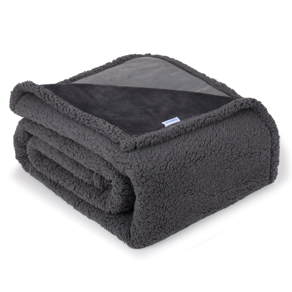 ZAKAPAWS waterproof blanket inner layer protects furniture from spills.