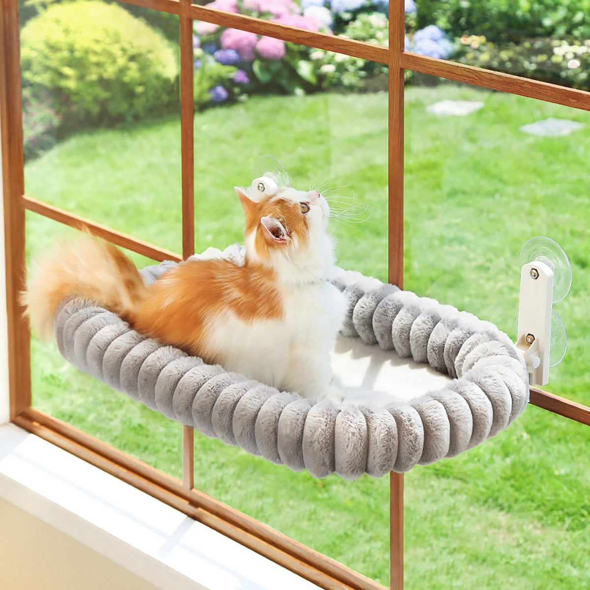 Zakkart SnugCloud foldable window perch shown in use, easy curtain access and compact storage.