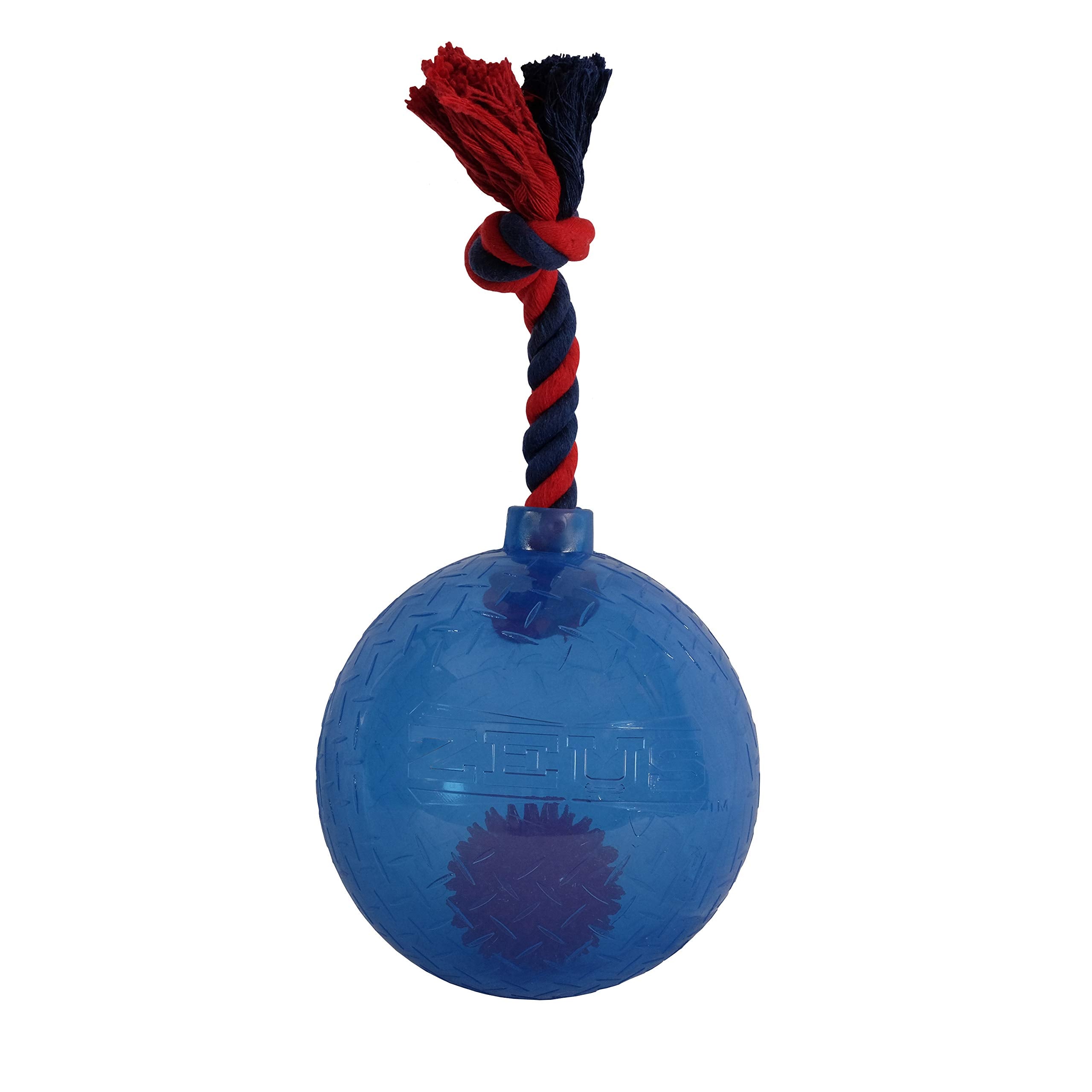 ZEUS Spark Tug Ball blue LED in action for nighttime fetch and interactive play.