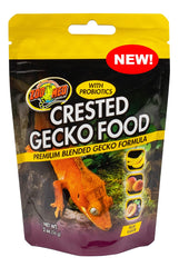 Zoo Med Crested Gecko Food plum 2 oz sits in a dish, supporting balanced daily feeding.