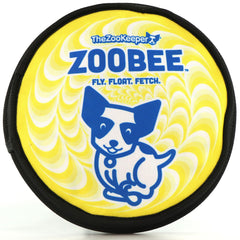 ZooBee flying disc dog toy in hand for easy outdoor fetch (clarity and control).