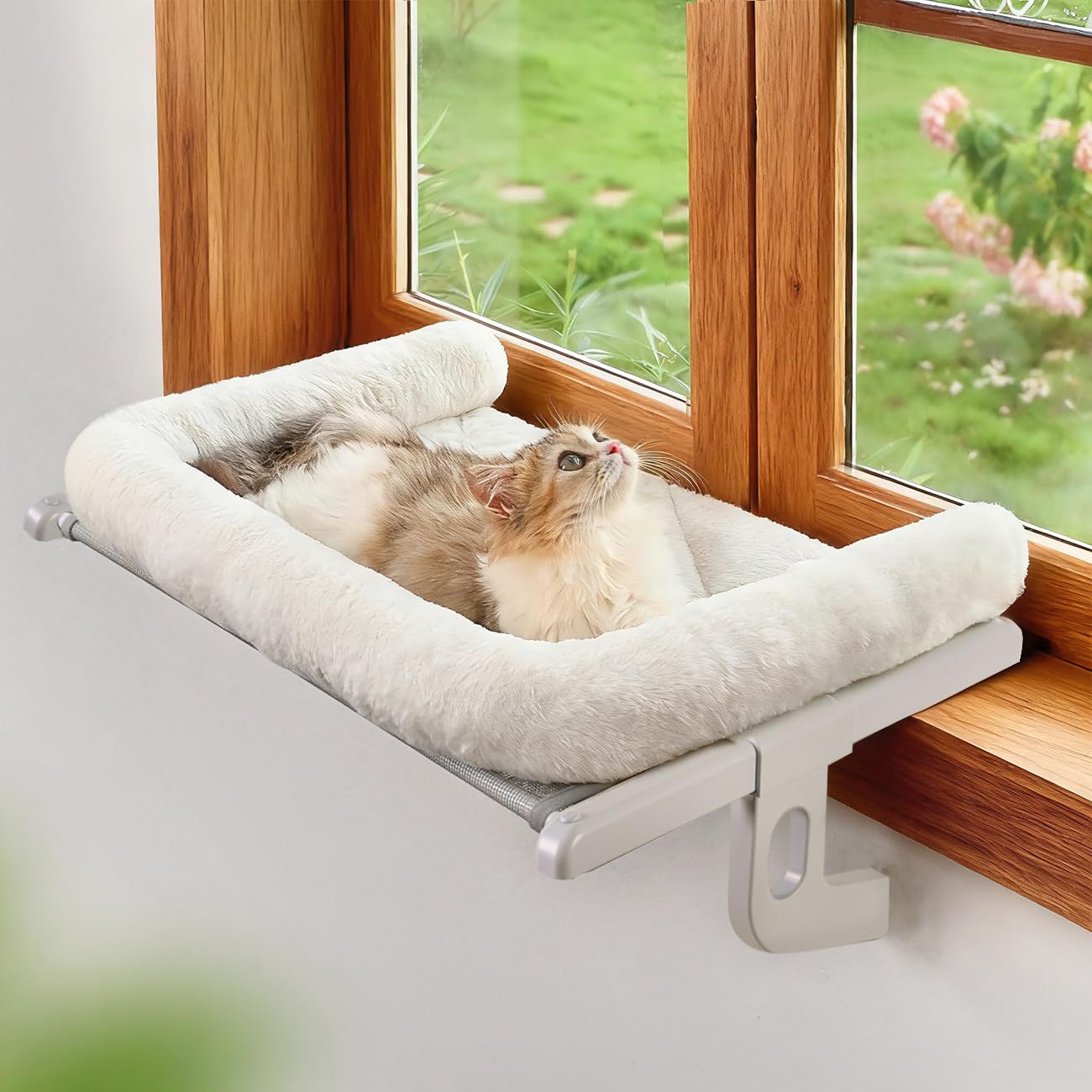 Zoratoo cat window sill perch with large bolster for cozy lounging.